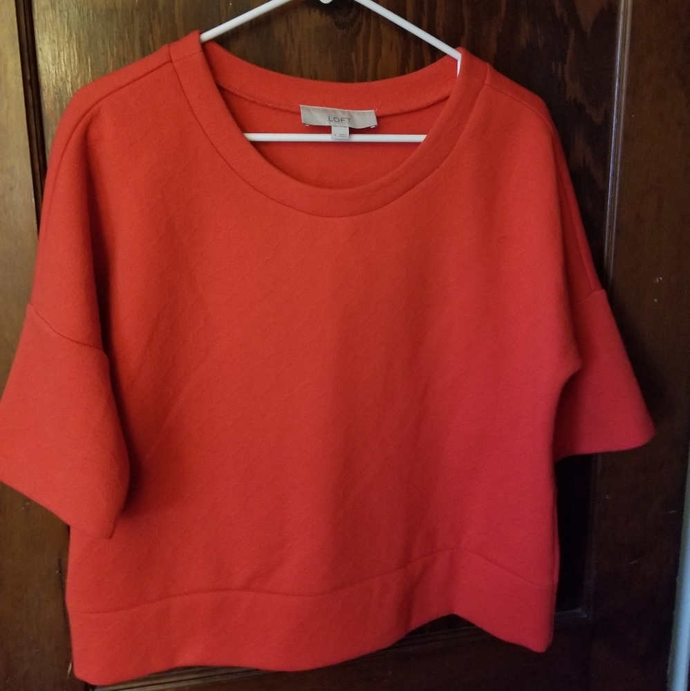 LOFT top in sunset orange.